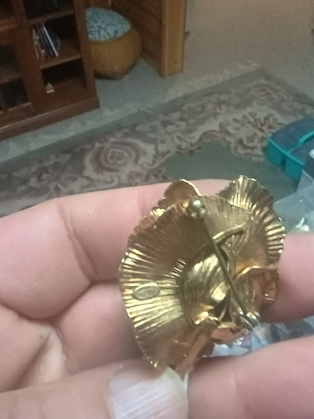 Gold-Tone Floral Brooch with Green Accent